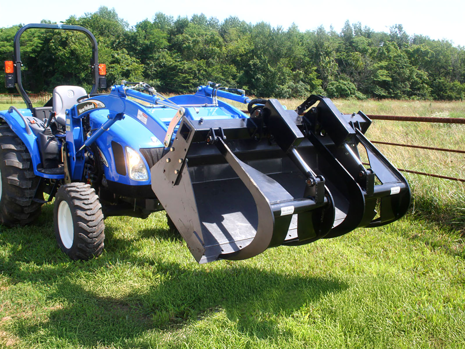 Contractor Add-A-Grapple on Large Tractor Bucket
