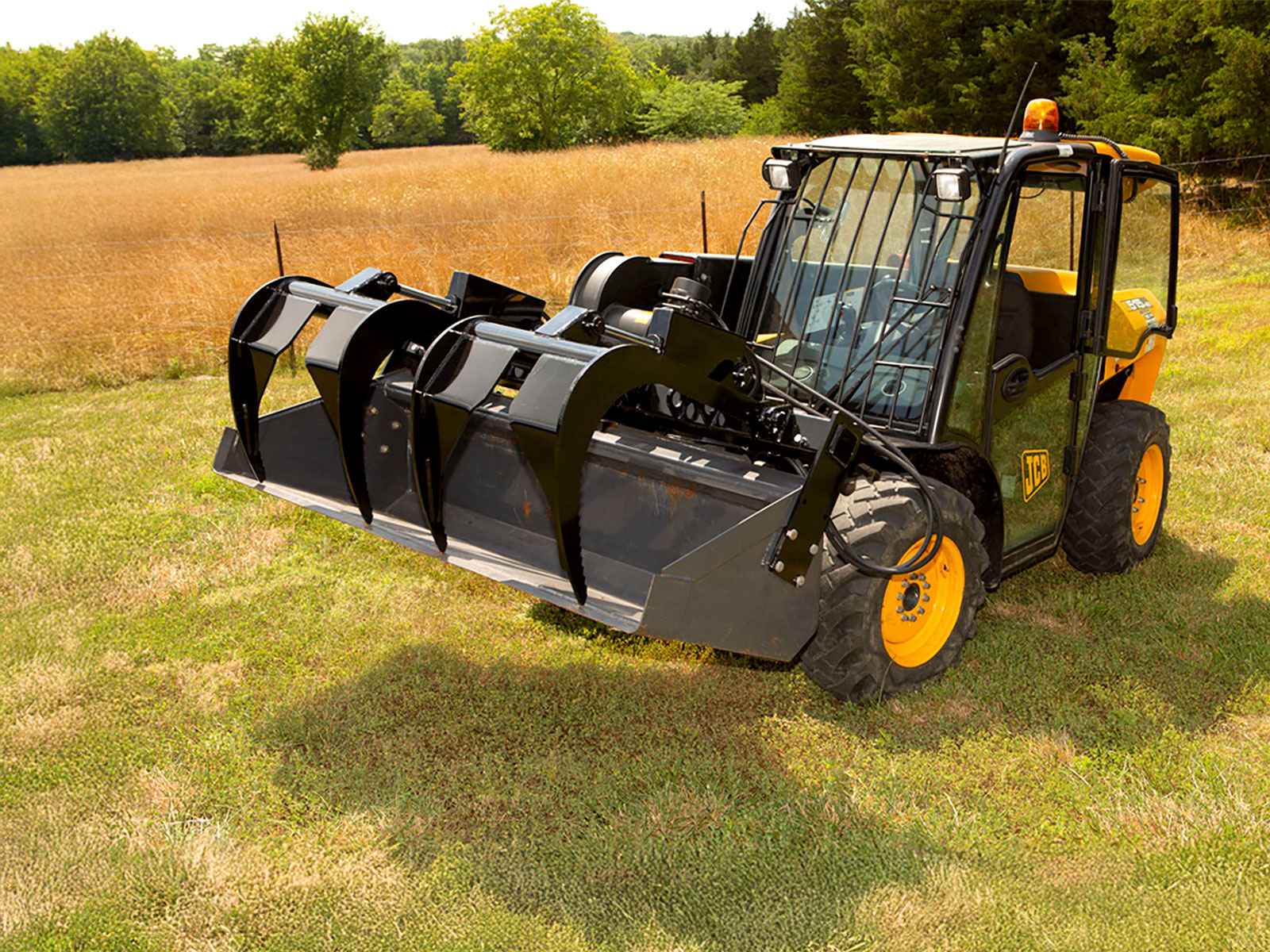 Heavy Duty Contractor Add-A-Grapple on Skidsteer Bucket