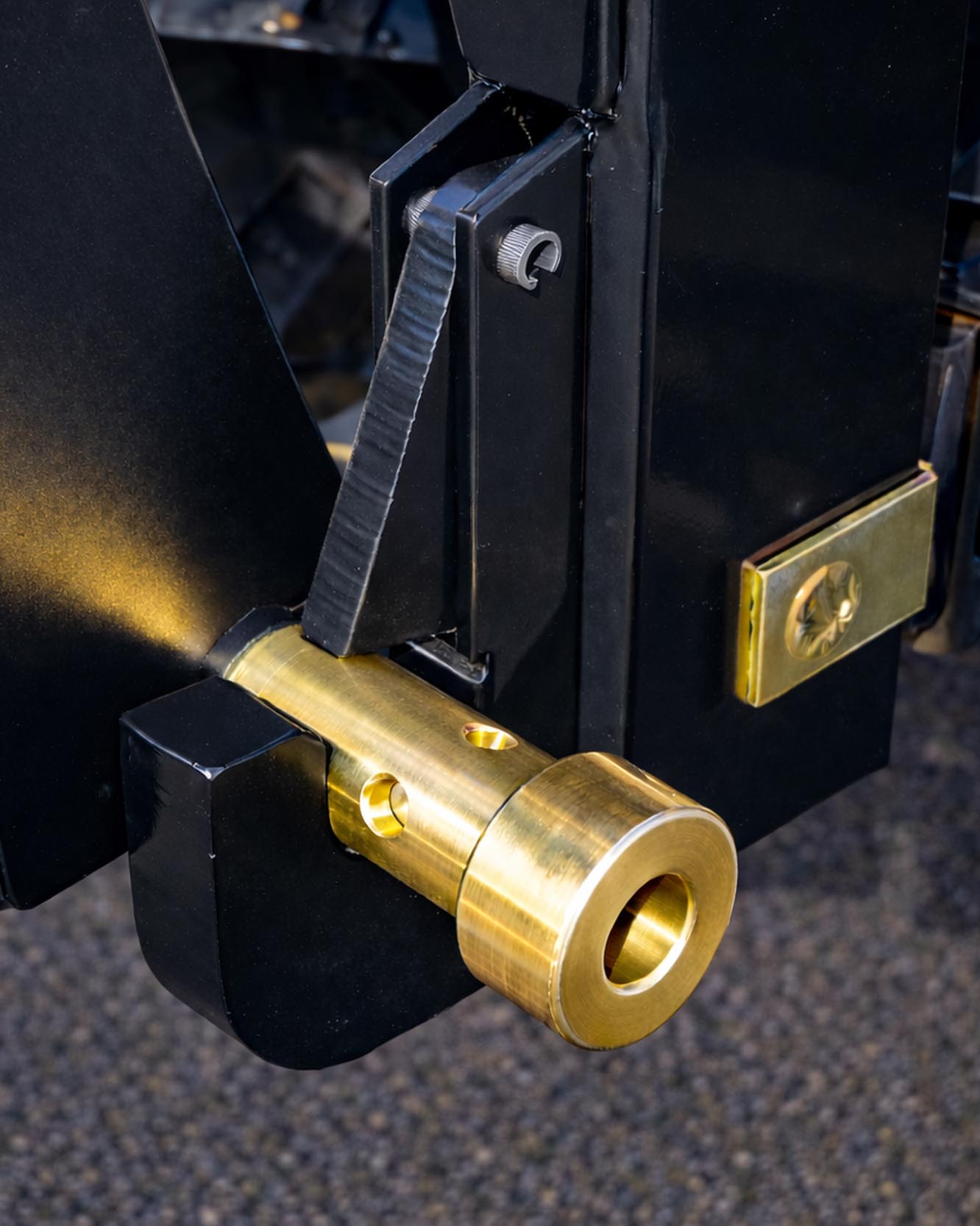 Brass Bushings in Lower Hook of Quick Hitch