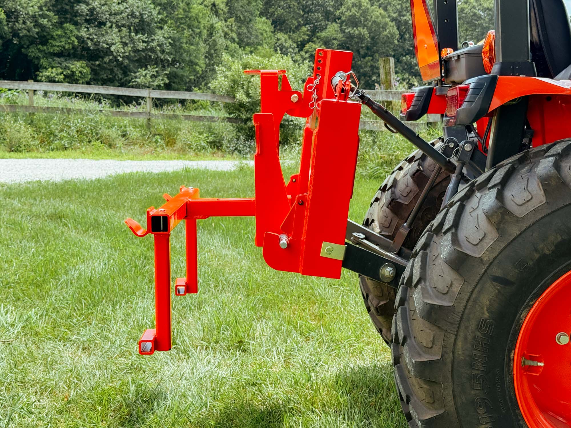 Side View of Trash Can Hauler, VersaBracket, and Fast Cat I (Orange)